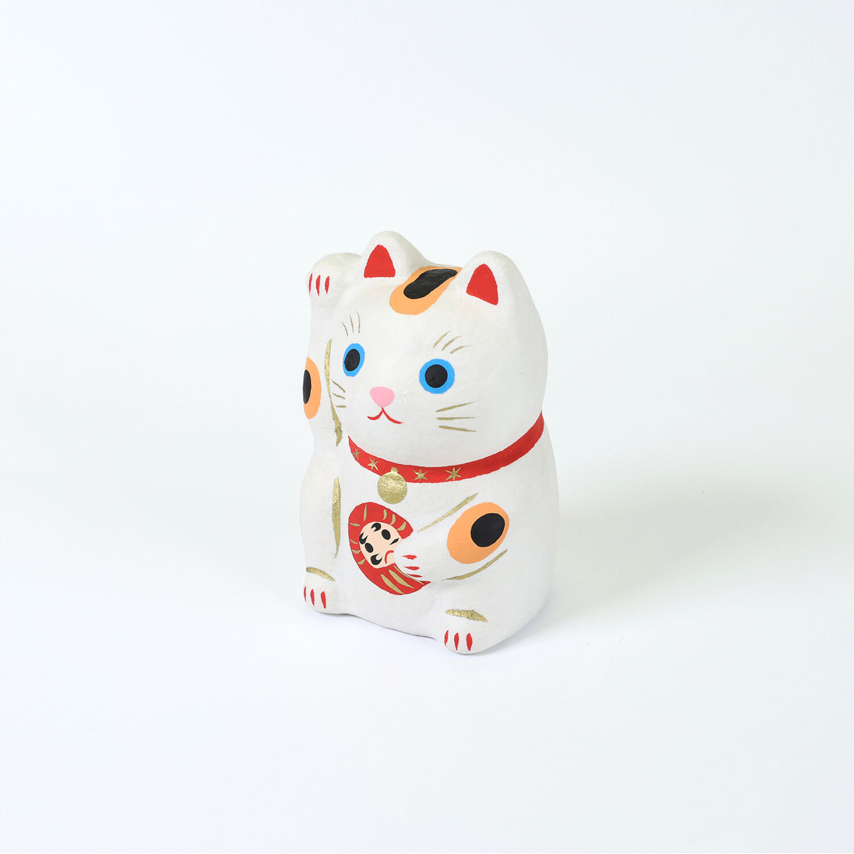 Maneki-neko de papel maché con daruma